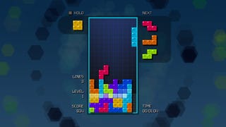 A game of Tetris Time Warp in Tetris Forever - the well is filling up with colourful blocks.