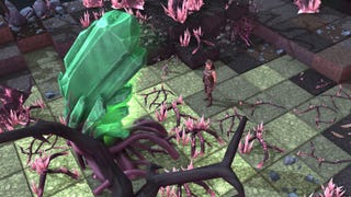 Standing in front of a large green crystal in Brighter Shores.