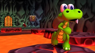 A Croc: Legend of the Gobbos remaster screenshot showing the cartoon crocodile navigating rocky platforms surrounded by lava.